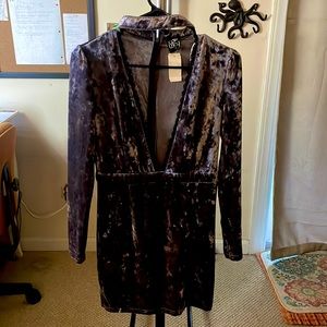 Brand new with tags: low v cut velvet,long sleeves. Perfect for New Year’s Eve!